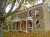 The old rock house on the banks of Celina Lake was built by Jacob Rickenbaugh, who came to the area in 1854. Rickenbaugh, who was born in 1822, acquired 320 acres of land here that year. He had selected the land for its abundance of fine old white oak and chestnut trees. As a tanner of hides, he needed a substance called 'tannin' from the bark of these trees to use in the tanning process. The site also had springs and fresh water which was another requirement of the tanning business.